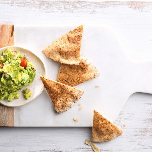 guacamole and pita bread slices