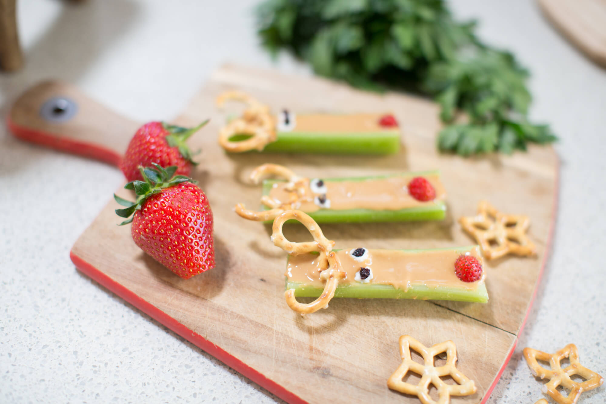 image of celery sticks as reindeers using food for decoration 